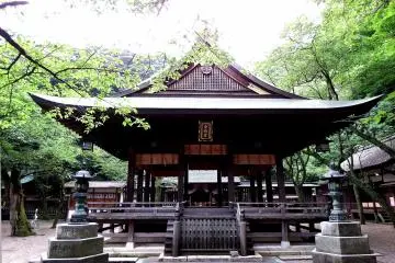 <p>This building probably is a Noh stage, or some platform where Shinto rituals are performed</p>