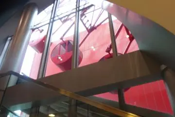 <p>The Ferris wheel runs through the upper floors of the shopping mall</p>