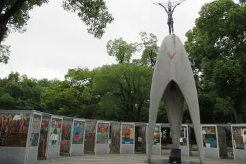 <p>The Children's Peace Monument in honor of Sadako Sasaki and all the other child victims of the bomb. It's surrounded by paper cranes made by those touched by Sadako's&nbsp;story.</p>