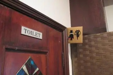 <p>A Tuxedo Kamen and Sailor Moon lavatory sign</p>