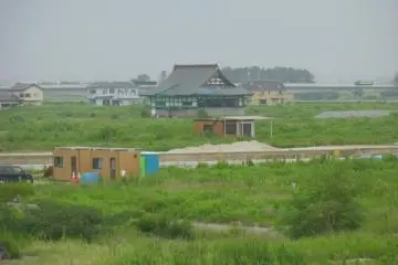 <p>Visible from the hill is the one temple out of three that survived. One was destroyed in the earthquake; the other in the tsunami.</p>