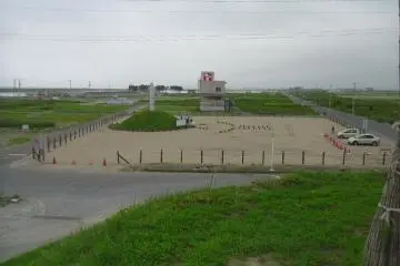 <p>The hill overlooks a new monument to those who died. The building in the background (a former business) will be preserved, whether this area becomes a nature reserve, a solar park, or something else.</p>