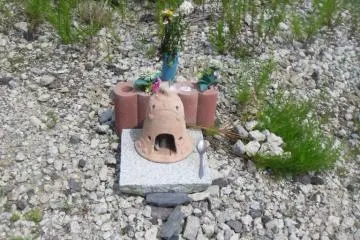 <p>Little offerings like this are some of the only reminders that houses once stood here</p>