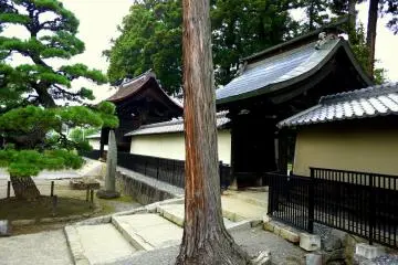 Two gates in the walls around one temple building