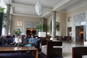 In the lobby of the Royal Park Hotel