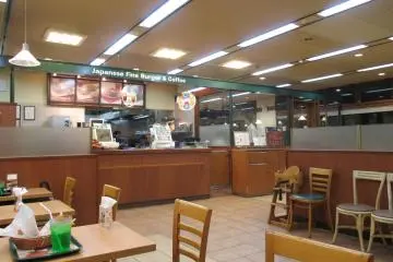 MOS Burgers often have a warm, light wood interior
