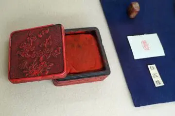 <p>A hanko stamp pad (stamps are used instead of signatures in Japan)</p>