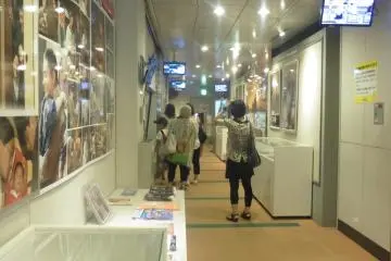 <p>The hallway from where it is possible to see the two filming studios</p>