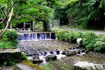 <p>Small waterfall near the bridge</p>