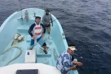<p>Jason, Ed &amp; Tim having fun on the front of the boat</p>