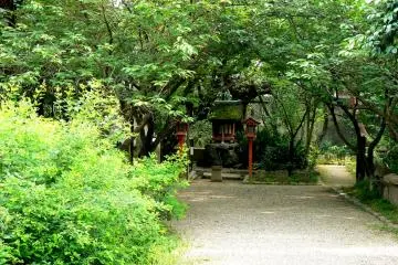 <p>A small red shrine near the back of the garden</p>
