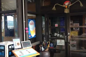 <p>Your attention is taken to the shimenawa new year charm at the entrance door. This provincial custom dates back to Edo period in the 17th century, when the shogun oppressed Christians in Amakusa. The townsfolk was forced to declare their allegiance to Shintoism by decorating their front doors with shimenawa.</p>