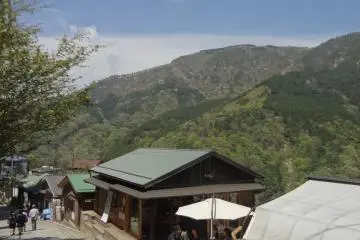 Coming down the slope from the train station, you'll find Naraya on your right facing the mountains.