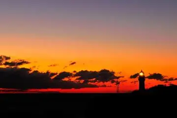 <p>Shiono Point Lighthouse at sunset. Shiono Point is the tip of Kii Peninsula, and you can enjoy the sunset here, and sunrise in Kushimoto, the neighboring town</p>