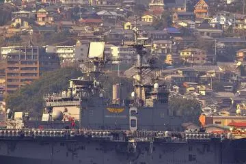 <p>View of United States Fleet Activities, Sasebo: Its warships, and a&nbsp;streetscape of Sasebo</p>