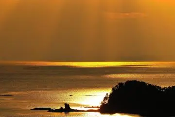 <p>Kujuku-shima Islands radiant in gold at sunset</p>