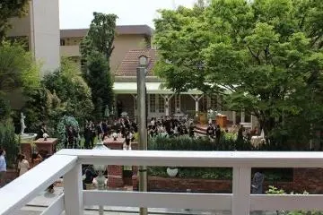 <p>Opposite the building's garden is a view of an area used for wedding ceremonies</p>