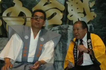 Sharp-eyed referees judging the final battle