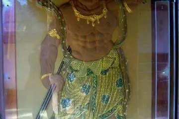 <p>Beautifully painted guardian protected under glass</p>
