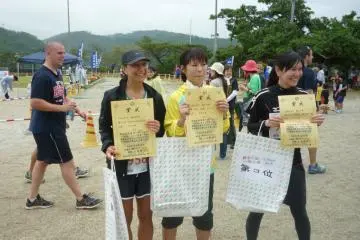 Collecting my second place finishers certificate and prize