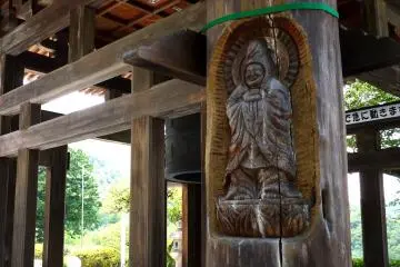 <p>Unusual carvings decorated the corner poles of the bell tower</p>