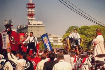 For the finale, the mayor of Matsuyama and governor of Ehime are jiggled about on shrines until they're dizzy.