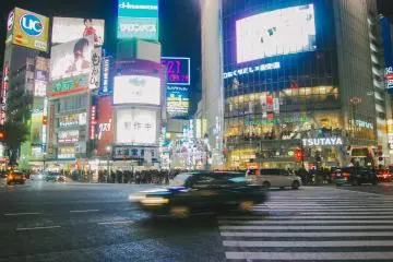 <p>How busy Shibuya Crossing is at night. The pedestrians are waiting for the traffic light.</p>