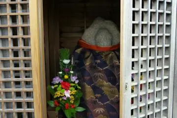 <p>Ojizo statue looking out on the world</p>