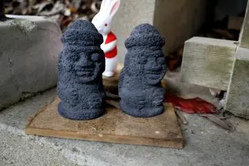 I don't think these tiny statues are Japanese!