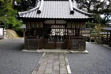 This building stands in the center of a gravel courtyard