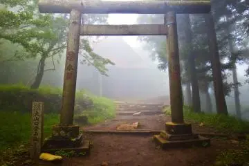 <p>The main `torii` (gate) on the approach to Upper Afuri Jinja with the main shrine several meters away in the foggy distance</p>