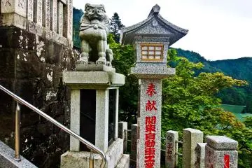 <p>Reaching the top! One of several statues guarding the approach to the main courtyard</p>