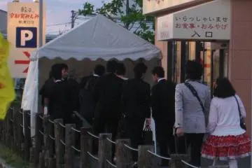 As the sun set, the queue grew
