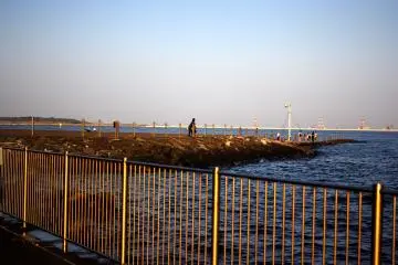 <p>Many people went all the way to the tip of the beach which is narrow but you will closest to the water and be able to see the airport better from there as well.&nbsp;</p>