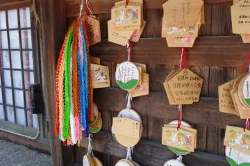 <p>Closer look of the emas (wishing plaques) and some senbazuru (1000 origami cranes)</p>