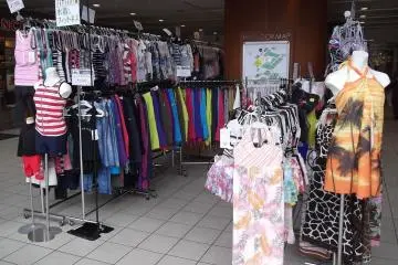 <p>More event sale racks at the front</p>