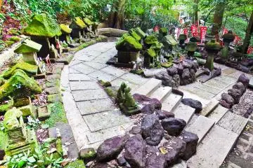 <p>From the top of this garden you can follow the hill upwards which joins the Daibutsu Hiking Course or return back down the long staircase if you want to disappear once more into the thick sea of red torii</p>