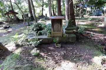 <p>Here's another one in a small wooden box-like shelter at the foot of some trees</p>