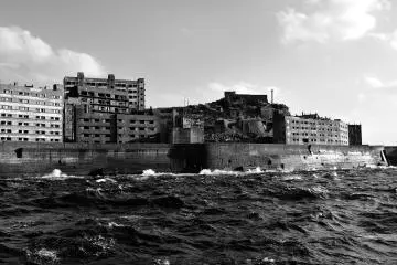<p>On the left is the isolation ward of Hashima Hospital</p>