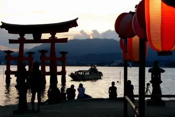 <p>Watching the sunset and waiting for a summer festival to begin</p>