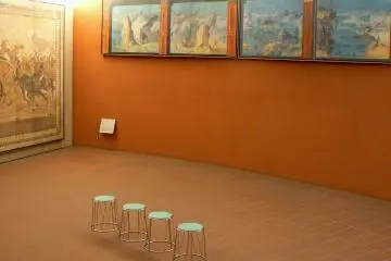 <p>The wall color enhances the art</p>
