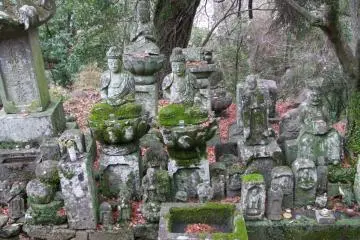 Many statues sit alone, but others are gathered in groups.