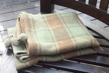 <p>The provision of a rug means that despite the slightly chill morning, you can sit outside and enjoy your coffee in the gardens</p>