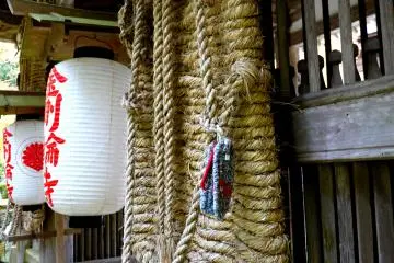 <p>Huge rope sandals hang on Nitenmon, the gate to the main hall</p>