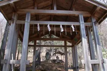 As you begin to climb the mountain, you find smaller shrines like this one