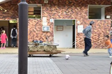 <p>Young and old going about their own business</p>