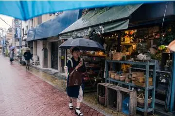 <p>Girl walking past a store that sells trinkets and great finds that you would love to&nbsp;decorate your home with.</p>