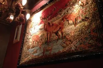 <p>Tapestries decorate the walls</p>