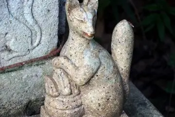 Close-up look at one of the cute fox statues