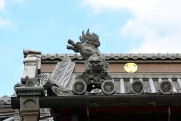 On the roof of&nbsp;Konpon Chudo. Who is he?